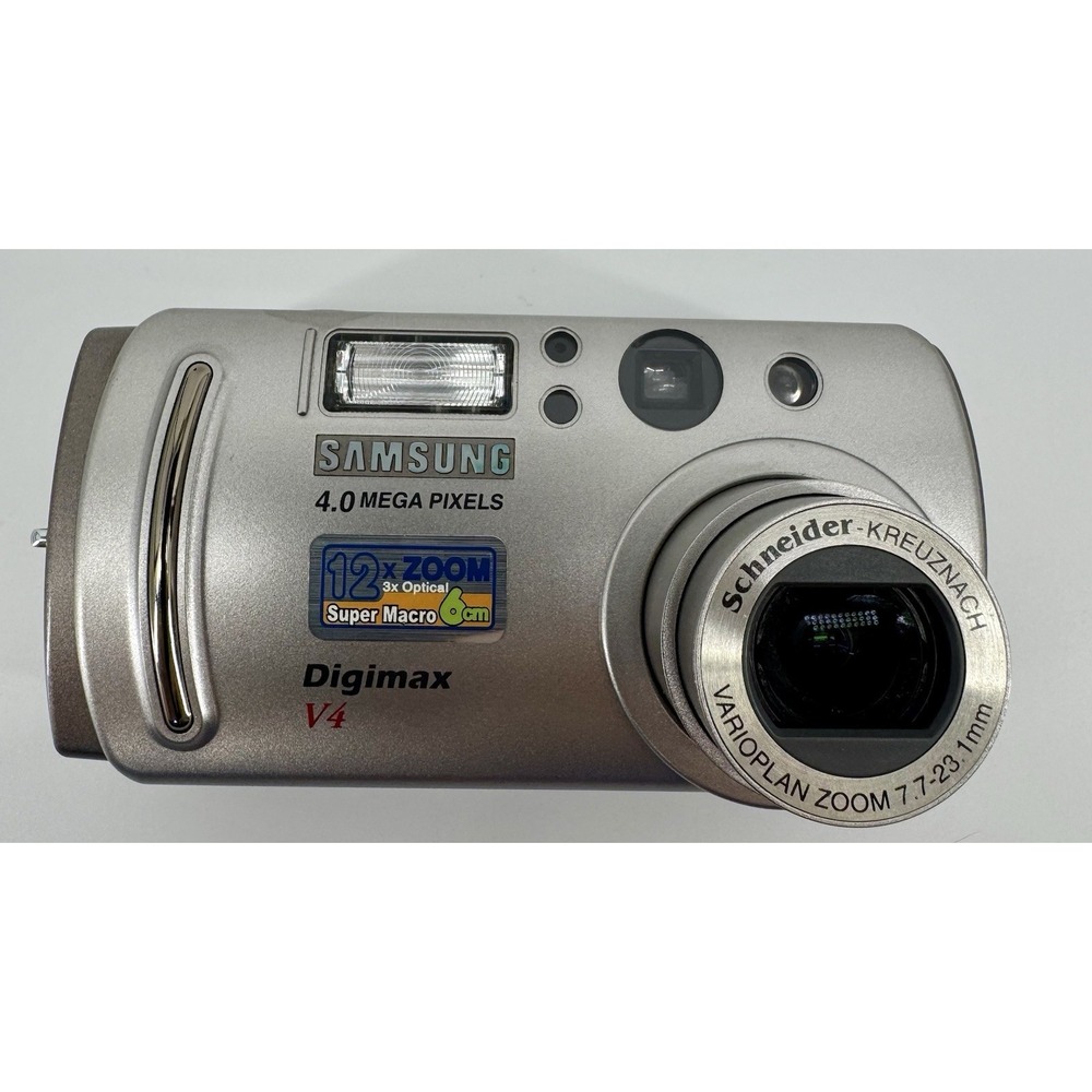 Samsung Digimax V4 Mega Pixels Digital Camera 12x Zoom Sliver with San Disk Card